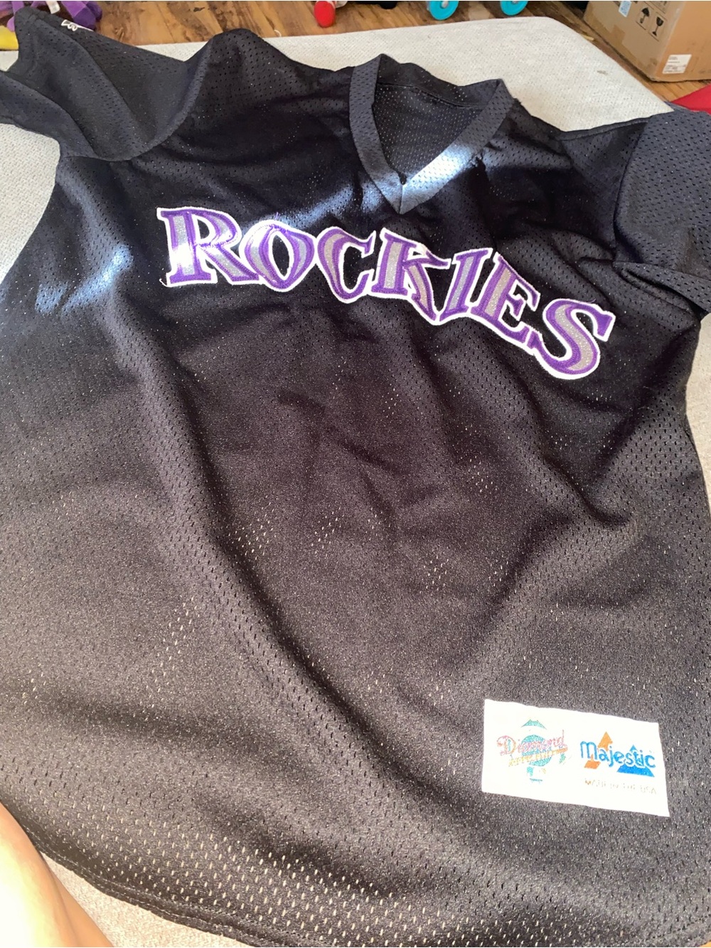 Majestic Black Kids Rockies Jersey with Purple Lettering